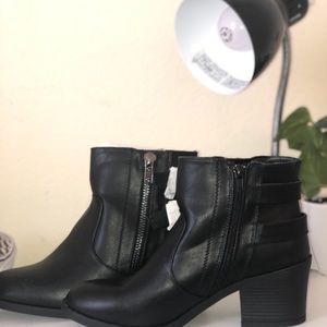 Buckled ankle boots. NEVER WORN.